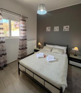 Posteľ alebo postele v izbe v ubytovaní Antigoni's Studio Cozy Private Apartment