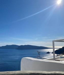 a view of the ocean from a boat at Enalion Suites in Oia