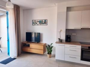 Kuchyň nebo kuchyňský kout v ubytování Apartman Madonnina