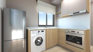 a kitchen with a refrigerator and a washing machine at Elafonisi Resort by Kalomirakis Family in Elafonisi