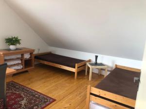Postel nebo postele na pokoji v ubytování Apartmán pod Lázněma