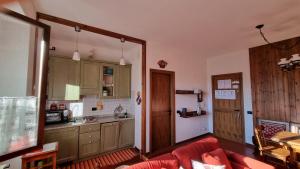 Η κουζίνα ή μικρή κουζίνα στο Appartamento Isabella - Residence Montesole