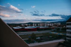 a view of a city with buildings and a parking lot at Wel Apartment in Gevgelija