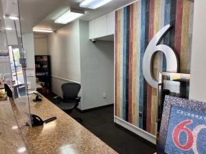 an office with a large letter b on the wall at Motel 6-Biloxi, MS - Ocean Springs in Biloxi