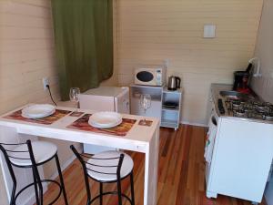 Køkken eller tekøkken på Cabana Uva Niágara