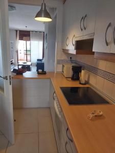 A kitchen or kitchenette at Apartamento Vera Playa (ALTOS NUEVA VERA)