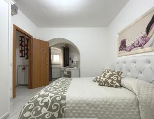 Postel nebo postele na pokoji v ubytování Bella Matera