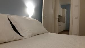 Posteľ alebo postele v izbe v ubytovaní Casa Mafalda