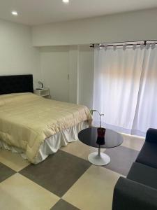 A bed or beds in a room at Depto en Monte Grande a 15 minutos del Aeropuerto