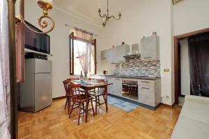 Kuchyň nebo kuchyňský kout v ubytování Luxury Domus AmaDora