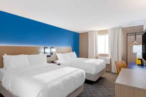 Postel nebo postele na pokoji v ubytování Comfort Inn Detroit - Troy