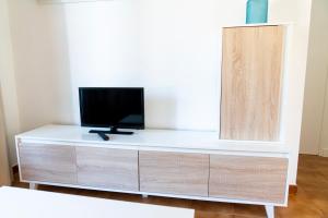 TV a/nebo společenská místnost v ubytování Apartamento Menorca Arenal d'en Castell