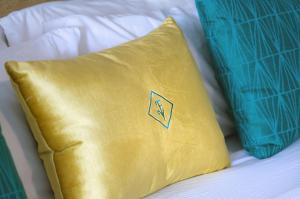 Letto o letti in una camera di Fort Young Hotel
