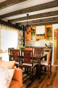 a dining room with a table and chairs at Geographer´s Cottage in Siegsdorf