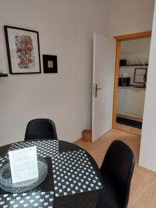 Kuchyňa alebo kuchynka v ubytovaní Dvoupokojový apartmán s kuchyňským koutem