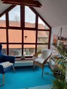 Posedenie v ubytovaní Dvoupokojový apartmán s kuchyňským koutem