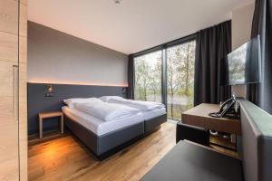 Postel nebo postele na pokoji v ubytování Hotel kommod + 37 fotografií