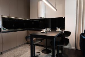 Kuchyňa alebo kuchynka v ubytovaní Apartamenty DES-Zator