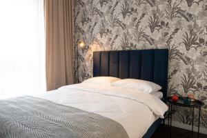 Posteľ alebo postele v izbe v ubytovaní Apartamenty DES-Zator