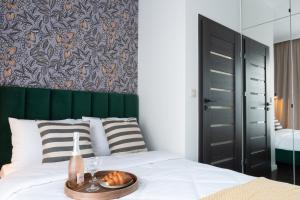 Posteľ alebo postele v izbe v ubytovaní Apartamenty DES-Zator