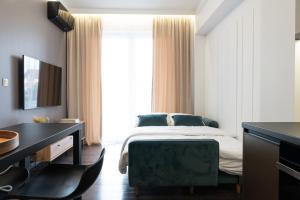 Posteľ alebo postele v izbe v ubytovaní Apartamenty DES-Zator