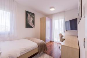 Postel nebo postele na pokoji v ubytování HOUSE MATIJA
