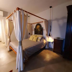 Ein Bett oder Betten in einem Zimmer der Unterkunft Lispusada Agriturismo Adults Only