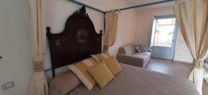 Ein Bett oder Betten in einem Zimmer der Unterkunft Lispusada Agriturismo Adults Only