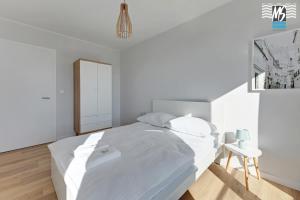Posteľ alebo postele v izbe v ubytovaní Ms Apartments Top Center VIII