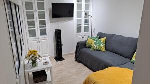 Ein Sitzbereich in der Unterkunft La Casita del Arco Ático