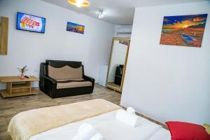 Postel nebo postele na pokoji v ubytování Casa ERICKA