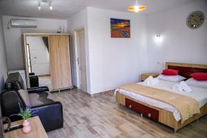 Postel nebo postele na pokoji v ubytování Casa ERICKA