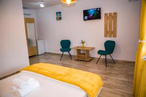 TV a/nebo společenská místnost v ubytování Casa ERICKA