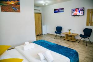 TV a/nebo společenská místnost v ubytování Casa ERICKA