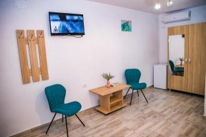 TV a/nebo společenská místnost v ubytování Casa ERICKA
