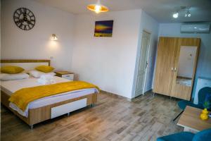 Postel nebo postele na pokoji v ubytování Casa ERICKA