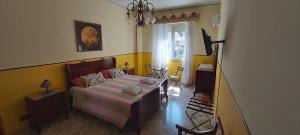 Ένα ή περισσότερα κρεβάτια σε δωμάτιο στο Tilde B&B