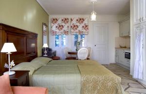 A kitchen or kitchenette at Dafnoudi Hotel Apartments