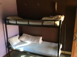 Poschodová posteľ alebo postele v izbe v ubytovaní Gorkha Organic Agro Farm