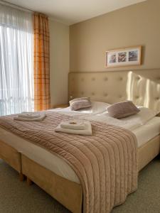 Postel nebo postele na pokoji v ubytování Lakeview Appartements
