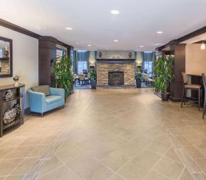 a lobby of a hotel with a fireplace at Sonesta ES Suites Atlanta Perimeter Center in Atlanta
