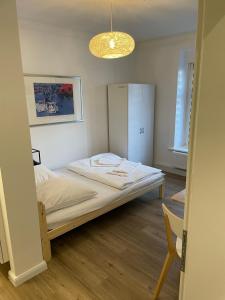 Una cama o camas en una habitación de Room Pauli