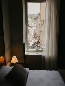 Letto o letti in una camera di Hotel Astra