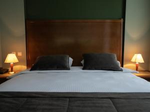 Letto o letti in una camera di Hotel Astra
