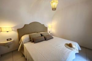 Postel nebo postele na pokoji v ubytování Milky Suites Positano