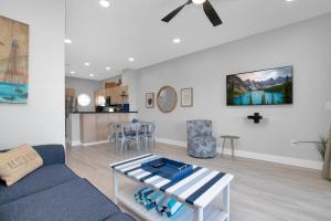 a living room with a couch and a table at Majestic Marina Villa- 2 bedroom Village at Hawks Cay in Duck Key