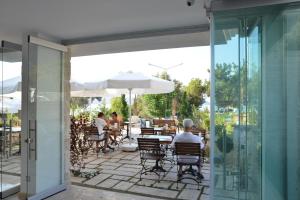 Restaurace v ubytování Arnna Hotel