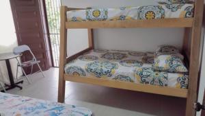 Katil atau katil-katil dalam bilik di AMPLIO APARTAMENTO AMOBLADO SECTOR LAURELES-ESTADIO Paris