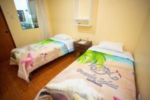 Posteľ alebo postele v izbe v ubytovaní POSADA SALAS & KARI PERU TRAVEL