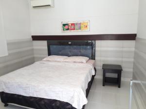 Postel nebo postele na pokoji v ubytování Manuh Guest House